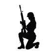 © Big Dream - A woman is holding a gun. She is kneeling down. The gun is a rifle. The woman is wearing a helmet