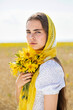 © Andrey_Arkusha - Close up portrait of a young woman in a traditional patterned headscarf