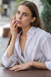 © Andrey_Arkusha - Portrait of a young beautiful woman in white shirt