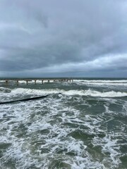 Wall Mural - stormy cloudy seascape, waves at the sea, rainy clouds