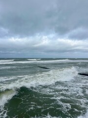 Wall Mural - stormy cloudy seascape, waves at the sea, rainy clouds