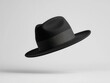 © Creator88 - Chic black fedora, captured in midflight, isolated on a clean light grey background for a minimalist studio look