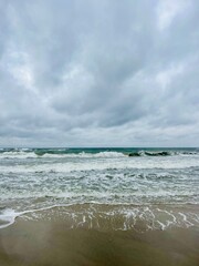 Wall Mural - stormy cloudy seascape, waves at the sea, rainy clouds