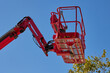 © Anna Baranova - Extendable cherry picker with hydraulic arm and close up on cradle with safety rail