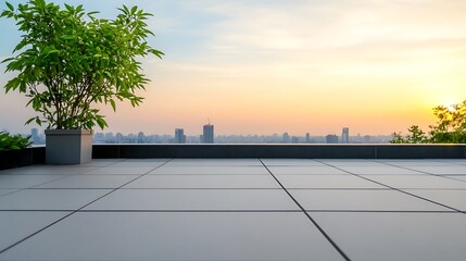 Canvas Print - Rooftop view of a city skyline with a potted plant at sunset.