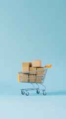 Poster - Miniature shopping cart with cardboard boxes on a light blue background symbolizes the rise of online shopping and home delivery