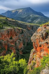 Poster - A scenic view of a mountain range with a valley in the foreground, ideal for use as a background or landscape image
