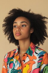 Poster - A woman with a vibrant afro hairstyle wears a brightly colored shirt, perfect for casual or cultural events