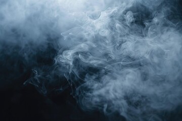 Poster - A close-up shot of thick smoke on a black background, ideal for representing mystery or suspense