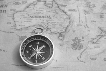 Wall Mural - classic round compass on background of old vintage map of world