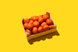 © Pixel Stories/Stocksy - Orange citrus fruits in crate