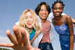 © Studio Firma/Stocksy - Teens posing and smiling