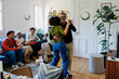 © BONNINSTUDIO/Stocksy - Happy family celebrating christmas at home