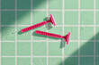 © Marc Tran/Stocksy - Pink Razor On Wet Green Tiled Surface In Bathroom