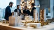 © Discover stocks - Real Estate Business Meeting Real estate developers discussing new project in an American urban setting with architectural models and financial plans on the table