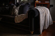 © Gillian Vann/Stocksy - cosy throw on sofa