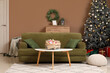 © Pixel-Shot - Interior of living room with sofa and Christmas Advent calendar on table