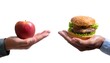 © Khaisan - One hand holding apple fruit, other holding hamburger. Healthy natural organic fresh vegetar