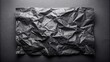 © Nipon - Damaged black folded paper with wrinkles and defects