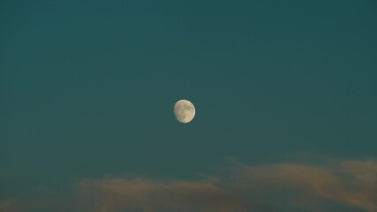 Wall Mural - Waxing Gibbous Moon Against The Blue Sky. - wide shot