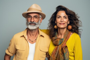 Wall Mural - A man and woman are posing for a photo