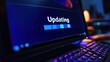 © arsya - A computer screen displaying an update progress bar with a keyboard in the foreground.