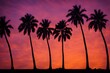 © Rabia - Row of palm trees silhouetted against a bright orange and purple horizon with the sun halfway set, Ai Generated
