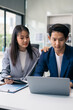 © NINENII - Businessman team working are under stress from financial data and report graph.