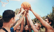 © peopleimages.com - Outdoor, people and happy on synergy with basketball at court for sports, match and tournament. Teammates, players and smile or satisfied with unity, solidarity and support for teamwork for games