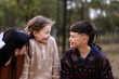 © Austockphoto - Aboriginal kids laughing and smiling together outside on overcast day