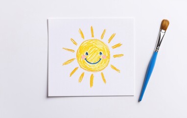 Poster - Bright and cheerful hand-drawn sun illustration on paper, perfect for children's art projects or educational materials.