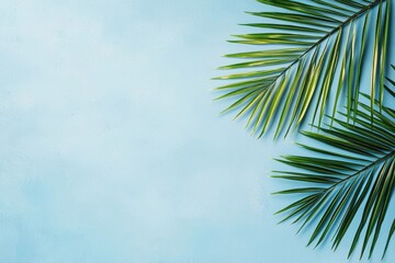 Poster - Vibrant green palm leaves against a serene blue background, perfect for tropical themes, summer concepts, or eco-friendly projects.