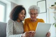 © Fox - A young woman patiently teaches her grandmother to use a tablet, creating meaningful connections and learning opportunities that strengthen family bonds and promote empowerment through technology