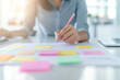 © Mongkol - Diverse office team collaborating on innovative business marketing strategies, engaging in brainstorming sessions for effective planning and execution