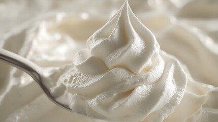 Poster - A sharp, true-to-life shot of a spoonful of whipped cream with visible air bubbles and a soft, fluffy texture. Cinematic Scene, 4k resolution, cinematic scene