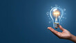 © Ajmeer - Hand-holding lightbulb icon with various symbols on blue background, representing ideas and innovation