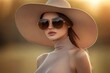 © kvladimirv - Elegant Woman in Sun Hat and Sunglasses at Golden Hour