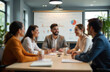 © yuntunen - Blurred background of diverse business team collaborating in meeting