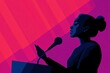 © BrandwayArt - Silhouette of a speaker at a podium against a vibrant background