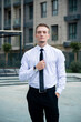 © Elina Leonova - Man, manager in city business center. Young businessman