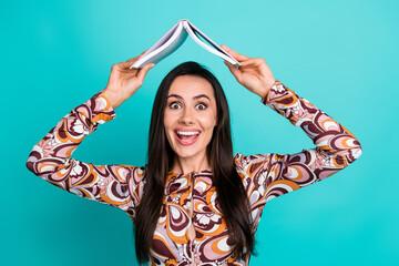 Wall Mural - Photo of excited attractive lady dressed retro shirt enjoy book empty space isolated blue color background