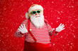 © deagreez - Portrait of his he handsome bearded fat overweight cheery Santa listen single hit sound stereo jazz funk rest chill leisure pulling suspenders isolated bright vivid shine vibrant red color background