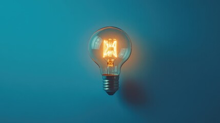 Aufkleber - Illuminated Light Bulb Against a Blue Backdrop
