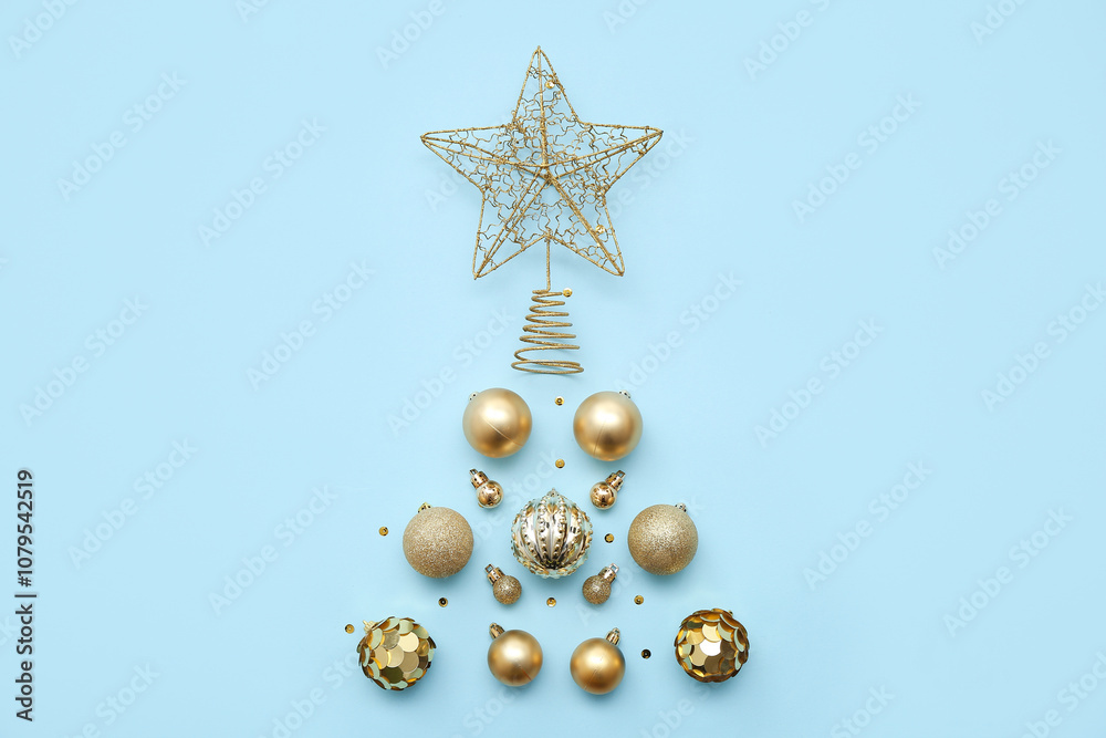 Christmas tree made of balls, decorative star and sequins on blue background