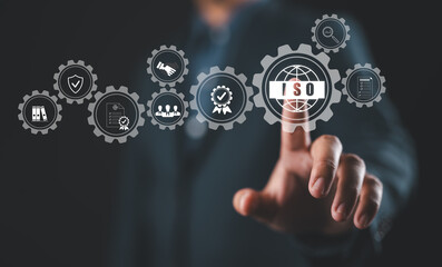 Poster - ISO Certification Concept. Businessman touch representation of ISO certification, icons symbolizing quality assurance, compliance, global standards, and International organization for standardization.