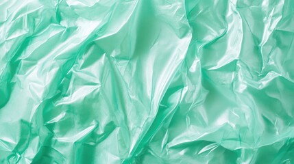 Poster - Mint green textured cellophane or plastic creates an artistic backdrop for your creative projects