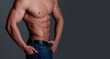© Volodymyr - Cropped image of fit man showing six pack abs. Perfect abs, shoulders, and chest. Close up the Abs. Closeup torso. Ab. Muscular torso and ripped abs. Sexy male muscular body.