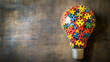 © sasisom - A light bulb made of colorful puzzle pieces symbolizing innovative ideas and creativity
