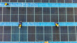 © ultramansk - Worker Technicians are working to construct solar panels system on roof. Installing solar photovoltaic panel system. Men technicians walking on roof structure to check photovoltaic solar modules.