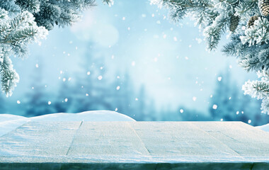 Wall Mural - merry christmas and happy new year greeting background with table .winter landscape with fir trees